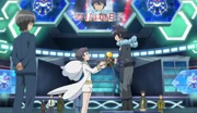 Diantha gives the Kalos League tournament cup to Alain.
