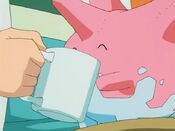 Corsola drinks from Elm's cup