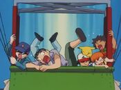 The heroes, Wilbur and Team Rocket are pushed to the floor