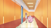 Nurse Joy and Chansey walk in to a room.