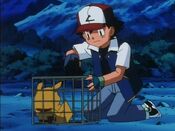 Ash attempts to free Pikachu