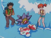 Misty with Goldeen, Starmie and Brock