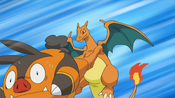 Charizard spins Pignite around