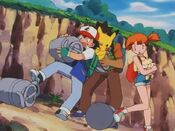 Ash, Misty and Brock stop the canisters from rolling