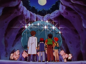 The Clefairy jump and twirl around the shining Moon Stone