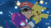 As Poipole being comforted by Ash and Pikachu