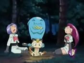 Team Rocket thinks of Wobbuffet, who stands behind them