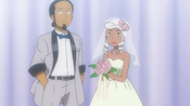 Kukui and Burnet, in formal outfits.