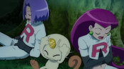 The scene cuts to Team Rocket