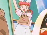 Nurse Joy holding Swinub