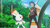 Goh tells Scorbunny what it needs to do in order to learn a Fire-type move