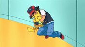 Ash gets Pikachu before it was pushed to the wall