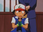 Ash gets restrained