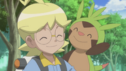 Chespin and its trainer, Clemont