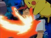 Ash gets hit by Flamethrower
