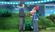 Alain and Ash shake hands after their battle.