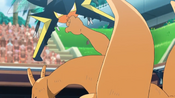 Vikavolt is stopped by Charizard's punch