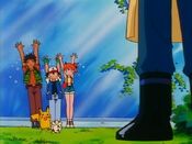 Misty, Ash and Brock put hands up at the "flamethrower"