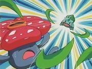 Bulbasaur usando hojas navaja contra Vileplume