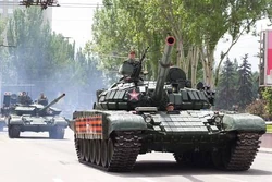122236389-donetsk-donetsk-people-republic-ukraine-–-may-9-2019-armored-soviet-tanks-t-72-driving-through-the-m.jpg