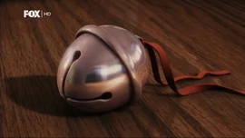 The silver bell in the film.