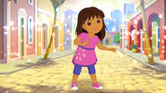 Dora as she appears in Dora and Friends: Into the City as a background image.