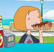 Lor eating a hotdog