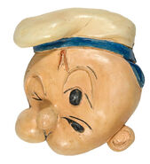 An even rarer Peepeye figural string holder toy also released in 1953