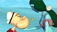 Popeye tries to kiss the Lady of the Deep