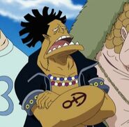 The villainous Popeye-like fishman Macro from One Piece