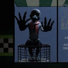 Stone putting his hands on the glass.