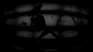 The shadow of Epitome Popgoes lurking in an abandoned building.