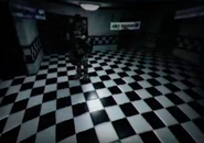 Popgoes holding the Blackrabbit's right leg.