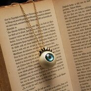 Blue Eye Ball & Eyelash Necklace ($153.48 USD)