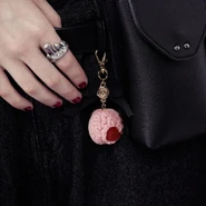 Bitten Brain Cake Bag Charm ($83.72 USD)
