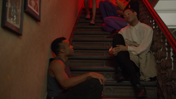  shares a flirtatous exchange of words with a cute boy named .