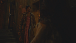  confronts the women laughing about her nearby.