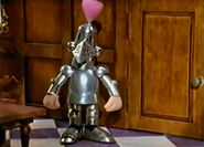 Ted Glen getting himself stuck in the hall's suit of armour.