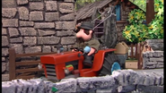 Alf Thompson driving the tractor
