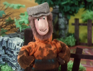 Peter Fogg in an orange outfit
