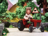 Peter driving the Red Tractor