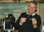 Ivor Wood holding Miss Hubbard's Bicycle during production of Series 2