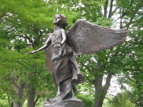 Statue of an angel blessing the garden