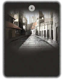 The cobbled street lined with ancient buildings