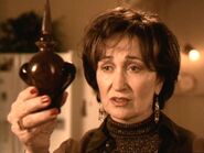 Penny (Charmed) with the power stripping potion.