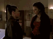 Drusilla kills Kendra.gif (4.13 MB) Drusilla (Buffy the Vampire Slayer) slashing Kendra's throat with her claws.