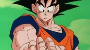 By touching his head, Son Goku (Dragon Ball series) reads Krillin's mind, allowing him to catch up on everything that happened before his arrival on Namek..