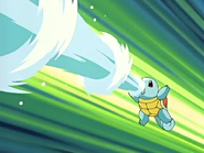 Squirtle (Pokémon) using "Water Gun" to fire a streaming bullet of water.