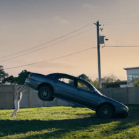 Annie January aka Starlight (The Boys) is able to lift the back of a car, meaning she lift well over 3,591 pounds (1.8 tons).