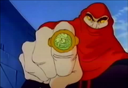 Verminous Skumm (Captain Planet and the Planeteers) uses his Toxics Ring to help create Captain Pollution.